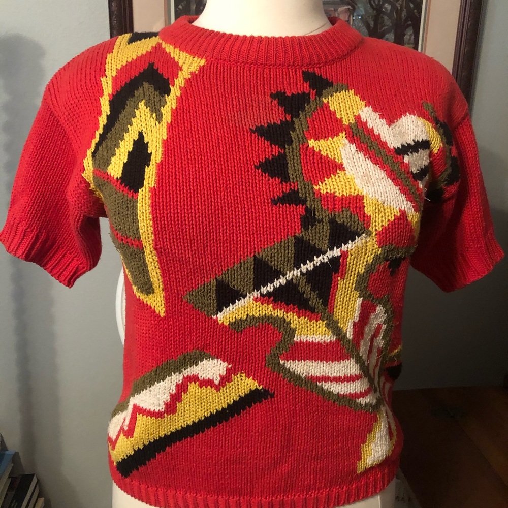 Bright red sweater with Indian mosaic